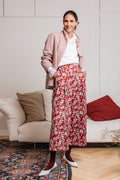 Giacca VELA rosa spigata in lana da donna con collo sportivo e bottoni in pelle intrecciata – Paglia Milano.